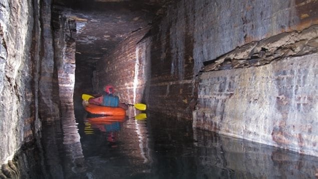 An inflatable canoe was brought down to further explore the new passage.