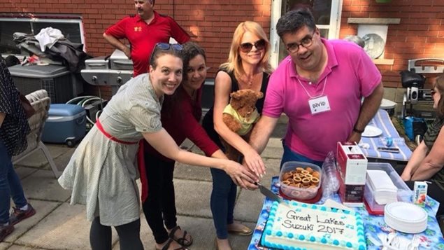 David Gerry celebrated with fellow teachers at the Great Lakes Suzuki Flute Institute in July 2017.