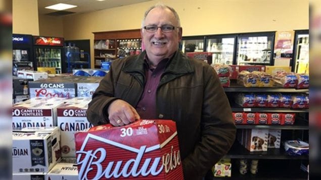 Gerard Comeau buying beer in Quebec after his 2016 court win in New Brunswick court. The province has appealed to the Supreme Court of Canada