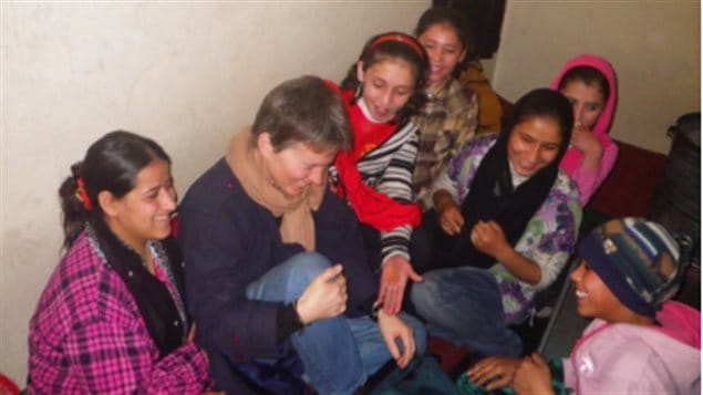 In an undated photo, Deborah Ellis talks to girls at an orphanage funded by Canadian Women for Women in Afghanistan.