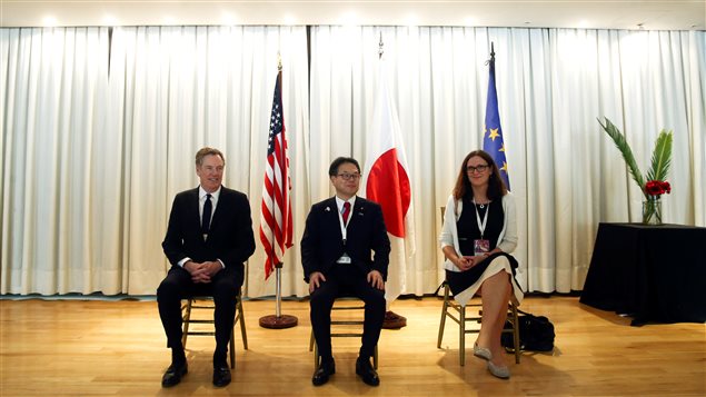 U.S. Trade Representative Robert Lighthizer, Japan’s Minister of Economy, Trade and Industry Hiroshige Seko, and European Commissioner for Trade Cecilia Malmstrom pose for a photo before a meeting at the 11th World Trade Organization’s ministerial conference in Buenos Aires, Argentina December 12, 2017.