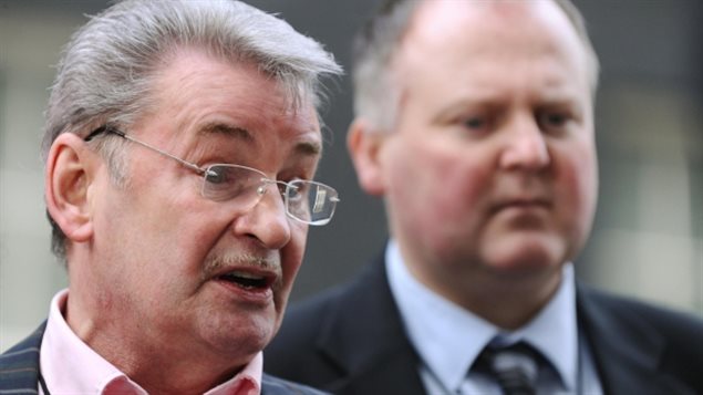 Michael Brown (left), the father of murdered Clare Wood, and Wood’s brother speak to the media after handing in a petition at 10 Downing Street in London, calling for a law change giving women the right to know if their partner has a history of domestic abuse. Clare’s Law came into effect in March 2014