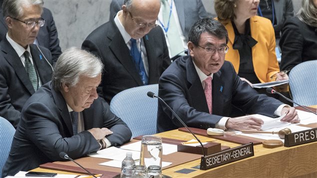 United Nations Secretary-General Antonio Guterres, left, listens as Japanese Foreign Minister Taro Kono speaks during a high level Security Council meeting on the situation in North Korea, Friday, Dec. 15, 2017 at United Nations headquarters.