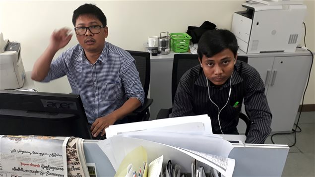 Reuters journalists Wa Lone (L) and Kyaw Soe Oo, who are based in Myanmar, pose for a picture at the Reuters office in Yangon, Myanmar December 11, 2017. 