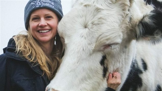 Animal rights activists such as Anna Pippus, seen here with a friend, are confident they have momentum on their side as their movement heads to the future. Pippus is a Vancouver-based an animal rights lawyer, strategist and activist who is Director of Farmed Animal Advocacy for Animal Justice Canada.  	