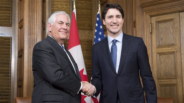 Canadian Prime Minister Justin Trudeau, right, shakes hands with U.S. Secretary of State Rex Tillerson at the start of a meeting on Parliament Hill in Ottawa, Tuesday December 19, 2017.