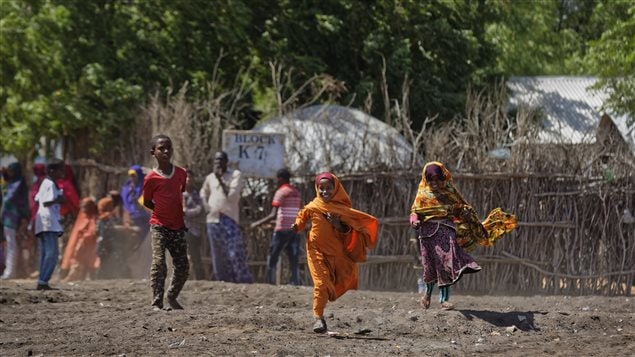 Somali refugee girls run to see the commotion during a visit of U.N. refugee chief Filippo Grandi, at Dadaab refugee camp, which currently hosts over 230,000 inhabitants, in northern Kenya Tuesday, Dec. 19, 2017. Grandi said Tuesday that the world must do more to help millions of refugees across sub-Saharan Africa, which hosts more than a quarter of the world’s refugees.