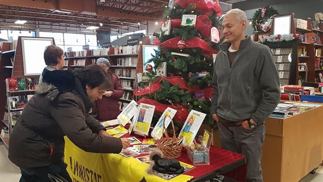 Supporters of Amnesty International’s local chapter in Sherbrooke, Quebec, take part in the annual Write for Rights campaign.