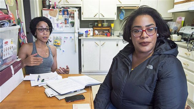 Inquiry advocates Cassandra Desmond, left, and her twin sister Chantel Desmond are seen in Antigonish, N.S. in June.