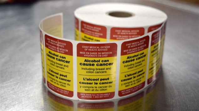 A roll of one of the two types of warning labels that were to be affixed to all beer wine and spirits sold in the Yukon city of Whitehorse during an eight month trial to assess their effect on drinking habits. The plan has been cut short due to industry objections