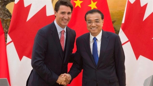 Chinese Premier Li Keqiang shakes hands with Prime Minister Justin Trudeau during Trudeau’s trip to China in September 2016. The government is eager to improve trade relations with China,. balancing trade against human rights has always been difficult for Canadian leaders.