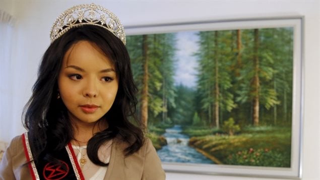 World beauty pageant contestant, Canadian Anastasi Lin said her father in China had been harrassed, and she was prevented from entering the country in 2015 for the Miss World Pageant.