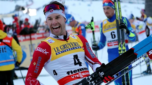 Alex Harvey was already pretty happy and practicing air guitar on Saturday before the race finished.