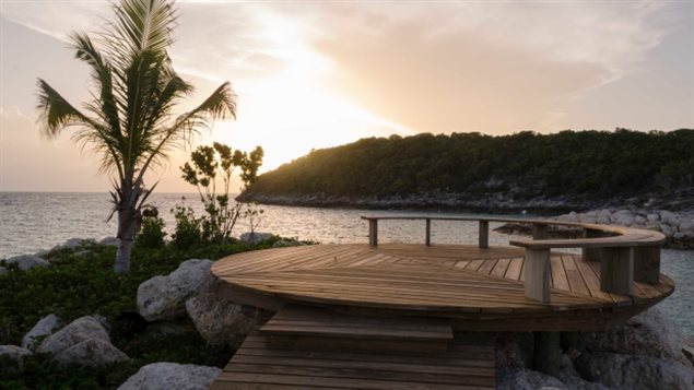 A wooden pathway leads to a scenic lookout on Bell Island in the Bahamas, where Trudeau vacationed as a guest of the Aga Khan