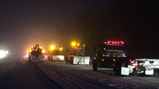 March 2017 Tow trucks arrive on the scene of a major winter pile-up on Hoghway 401 near Kingston Ontario due to blizzards white-out conditions. On person died, many were injured