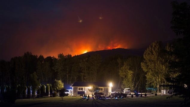 Too much rain in B.C, was followed by a summer of drought leading to a recodr number of wildfires.A wildfire burns on a mountain behind a home in Cache Creek, B.C., in the early morning hours of Saturday July 8, 2017.