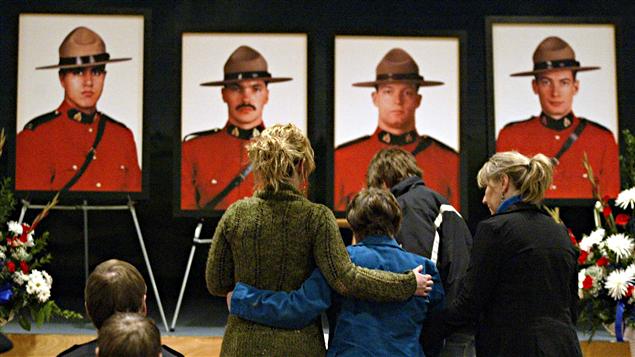 Les photos des quatre policiers tués le 3 mars 2005.