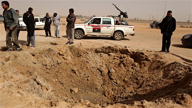 Ajdabiya, 14 mars 2011 L'armée de Kadhafi redouble ses attaques et gagne du terrain.