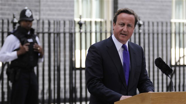 Le premier ministre britannique David Cameron exhorte le colonel Kadhafi à quitter le pouvoir lors d'une conférence de presse le 22 août 2011. 