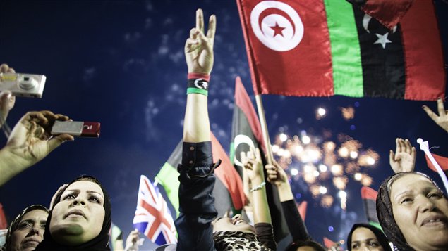 Des Libyens célèbrent la libération dans la capitale Tripoli