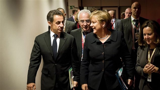 Le président français Nicolas Sarkozy et la chancelière allemande Angela Merkel à l'ouverture des discussions à Bruxelles, jeudi