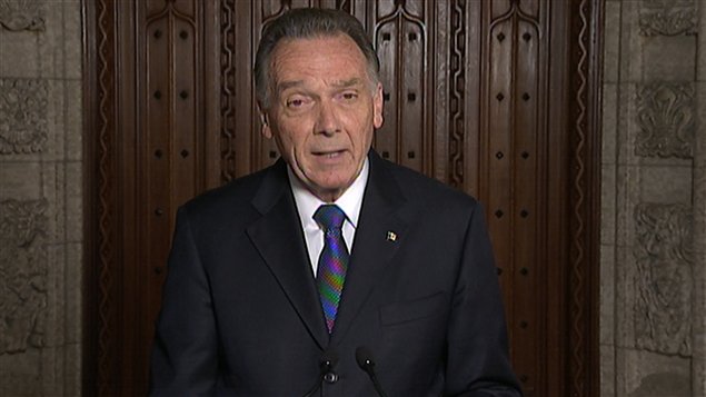 Le ministre Kent, annonçant officiellement aux Canadiens le retrait de Kyoto.