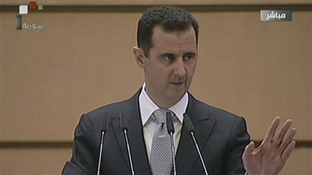 Le président syrien Bachar Al-Assad prononce son premier discours depuis l'arrivée des observateurs de la Ligue arabe en Syrie.