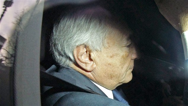 Dominique Strauss-Kahn lors de son arrivée au poste de police de Lille, en France, le 21 février