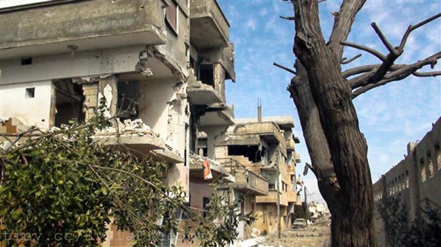 Cette photo fournie par l'agence SANA montre l'ampleur des detsructions dans le quartier Baba Amr de Homs.