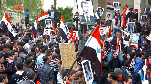 Manifestation pro-Assad dans la région de Deraa. AFP ne peut vérifier l'authenticité de cette photo.