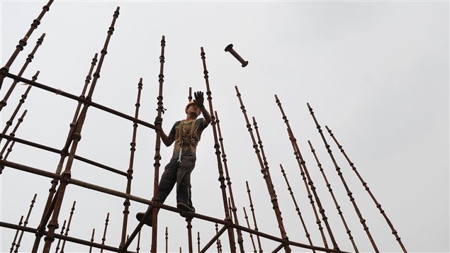 Un travailleur de la construction à Hefei, en Chine