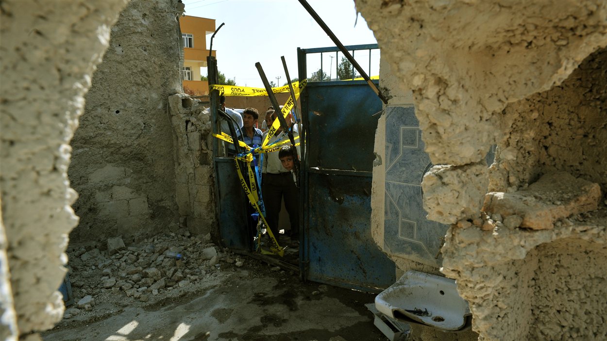 Ruines de la maison où les cinq victimes ont été tuées par des tirs d'obus