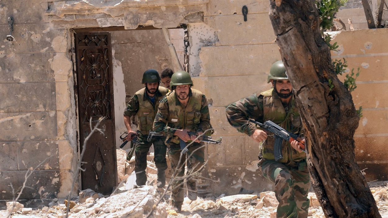 Photo de soldats du régime syrien, fournie par l'agence de presse officielle de Syrie, Sana.
