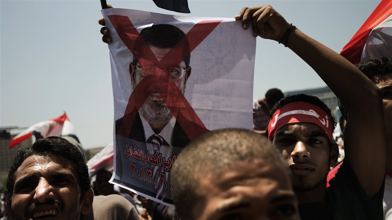Des manifestants égyptiens opposés au président Morsi, sur la place Tahrir.