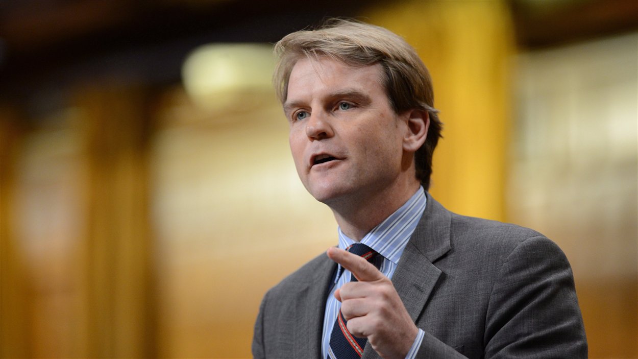 Le député conservateur Chris Alexander pendant la période des questions, à la Chambre des communes, le 18 juin 2013.