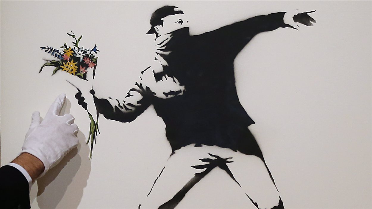 Une des oeuvres les plus célèbres de Banksy, « Love is in the air »