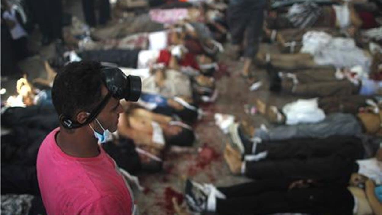 Cette image, prise dans une morgue de fortune, place Rabia al-Adawiya, témoigne de la violence des affrontements.