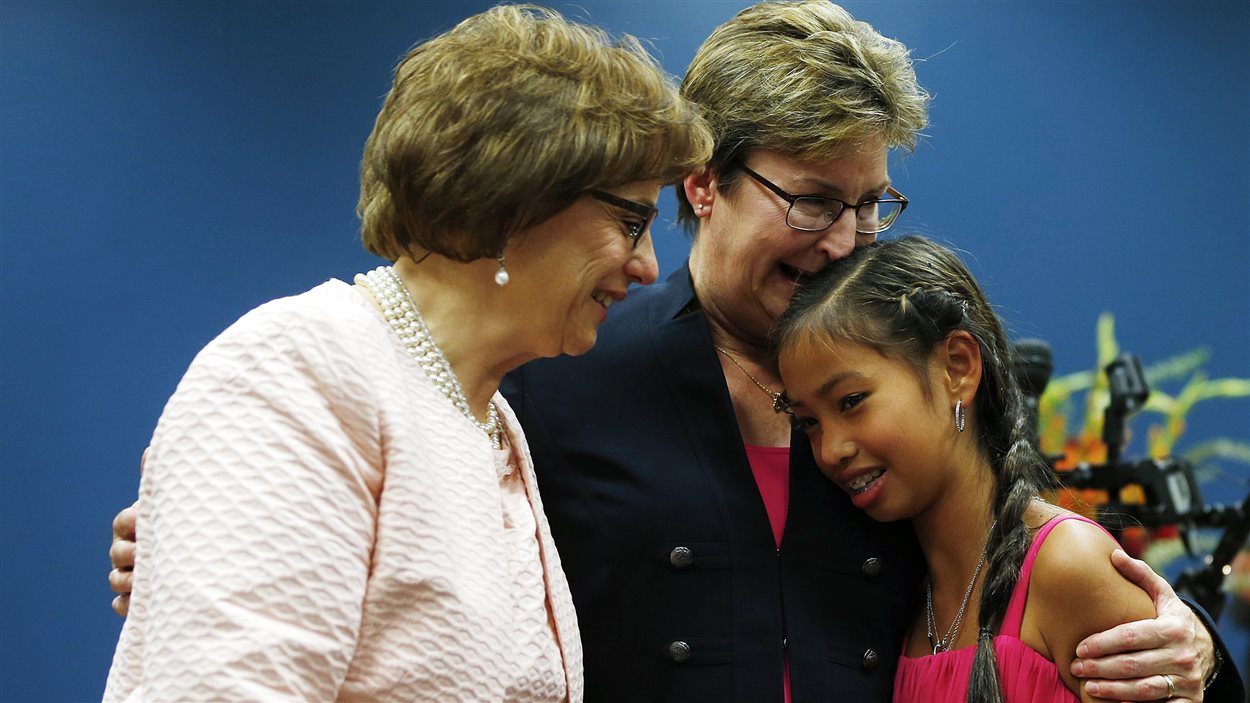 Beth Asaro et Joanne Schailey (ici avec leur fille Kate) sont le premier couple gai légalement marié du New Jersey.