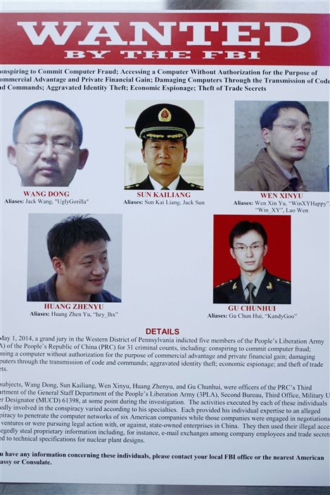 Les cinq militaires chinois qui étaient recherchés pour cyberespionnage.