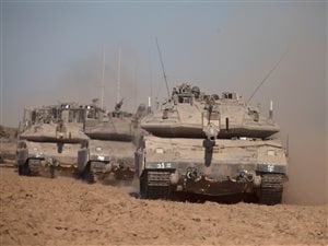 Les chars d'assaut israéliens, qui se rendaient à Gaza jeudi. 