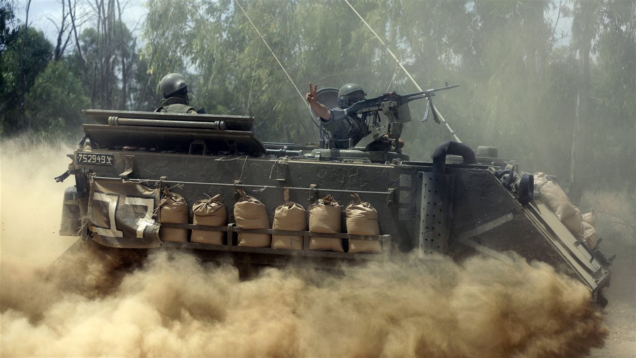 Des soldats israéliens aux abords de la frontière avec Gaza, le 19 juillet 2014