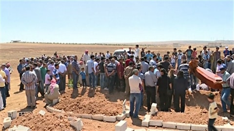 Mise en terre des membres de la famille Kurdi à Kobané