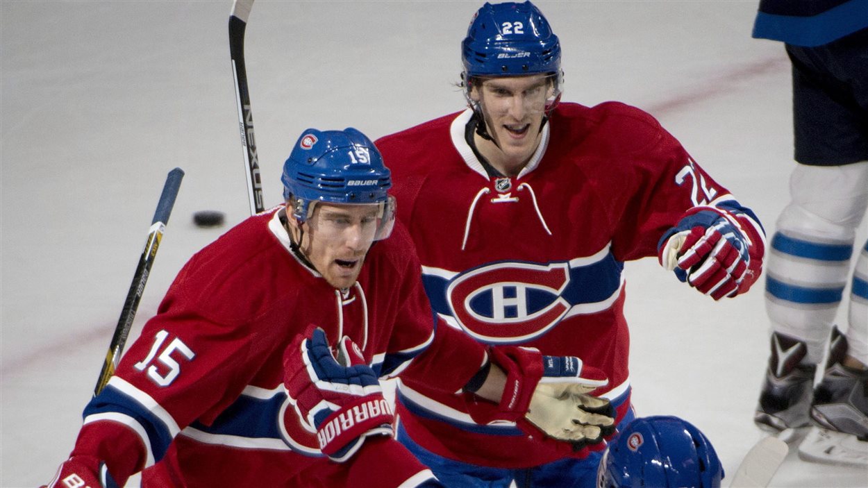 Tomas Fleischmann célèbre son but avec Dale Weise et David Desharnais.