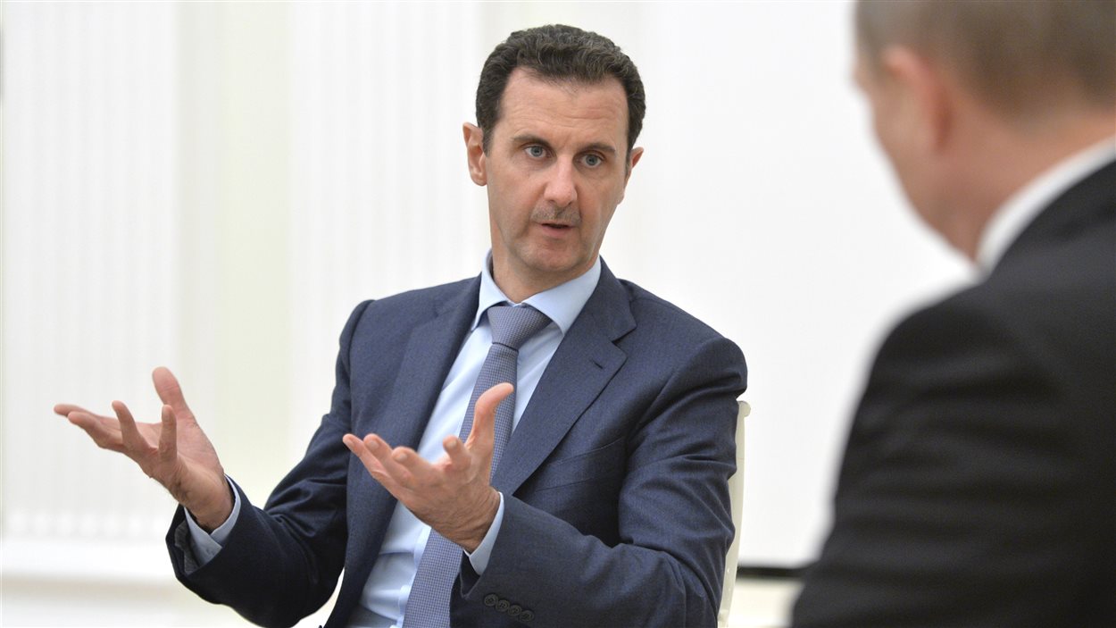 Le président Bachar al-Assad lors d'une rencontre avec le président russe, Vladimir Poutine
