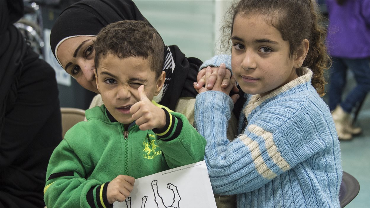 Des réfugiés syriens à Beyrouth, au Liban, avant leur départ pour le Canada, le 9 décembre
