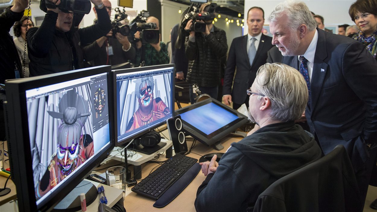 Philippe Couillard avec des employés des Studios Cinesite.