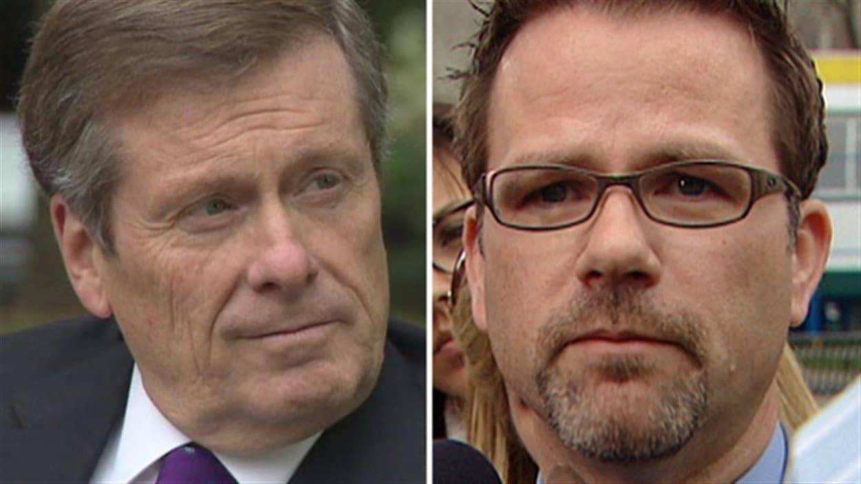 Le maire de Toronto John Tory (à g.) et le président du local 79 du SCFP, Tim Maguire.