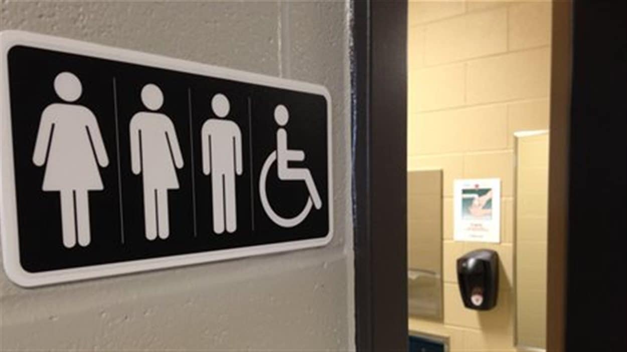 Un pictogramme montrant des toilettes unisexes.