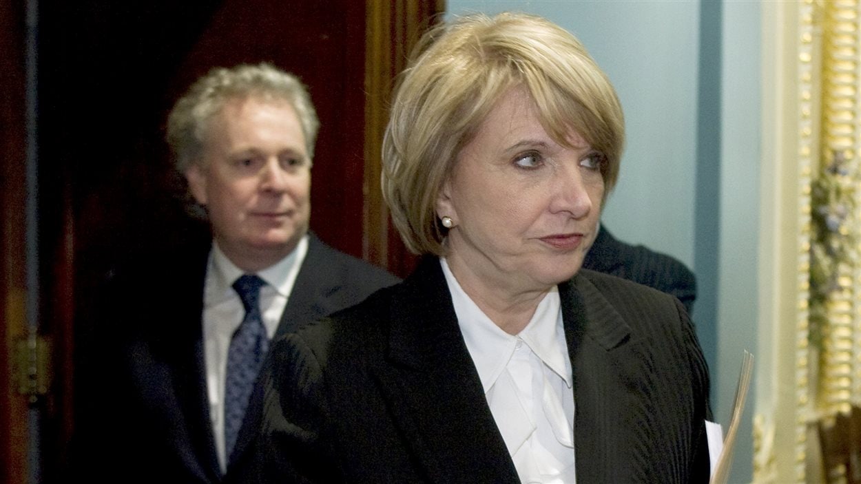 Monique Jérôme-Forget, alors ministre des Finances du Québec, et le premier ministre Jean Charest en 2009